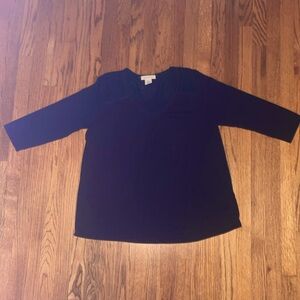 Black top with semi sheer panel